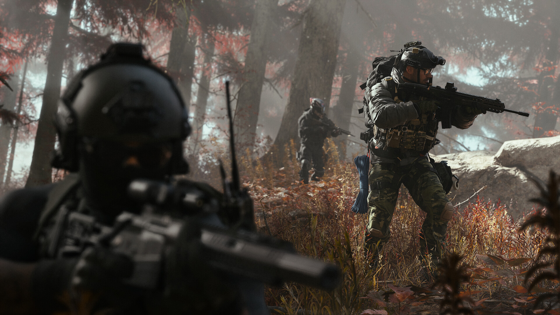 ภาพจากเกม Call of Duty: Modern Warfare 4 ทีมทหารเคลื่อนที่ผ่านป่าในฤดูใบไม้ร่วง (ภาพ: Activision / Infinity Ward)